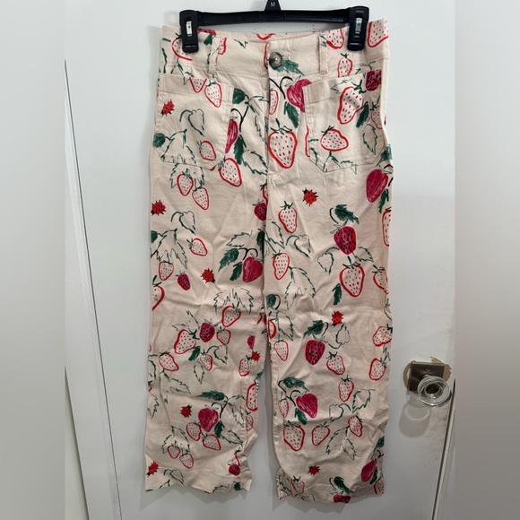 Anthropologie Pants - Anthropologie Cream Pants with Red Strawberry Print